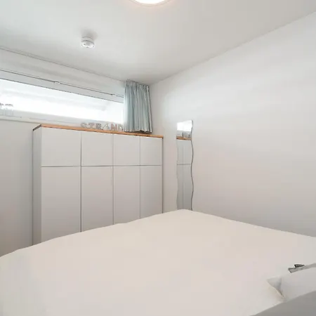 App 115 - Strandlage *